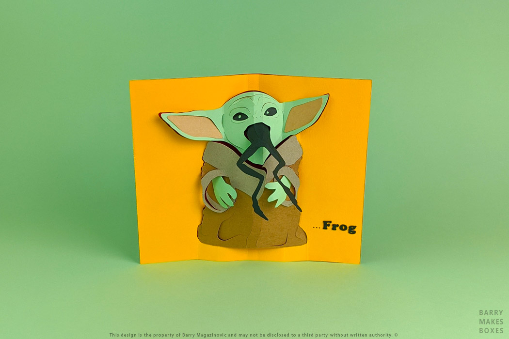 Australian Packaging Design, Product Design Special Unique Present Baby Yoda all I want for Christmas is frog gift card pop up Paper craft Art work Sculpture Cardboard frame Paper kraft craft character on green by Barry Makes Boxes, Barry Magazinovic